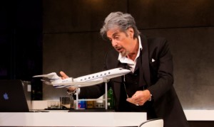 Playwright Intent: God-like ego of Mickey Ross towering over the model plane.